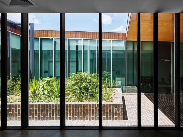 our voices indigeneity and architecture in white and black font on red cover, ORO Editions to bottom right