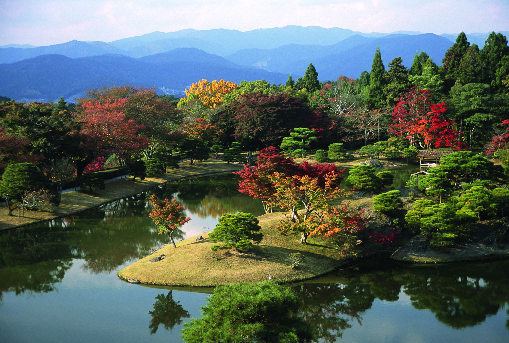 Karesansui garden, raked sand garden, green topiary shrubs, A Guide to the Gardens of Kyoto in white font on dark green square to centre