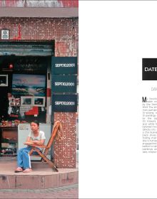 Old atlas map in circle shape, contents headers circling map, on white cover, LA+ to top right corner