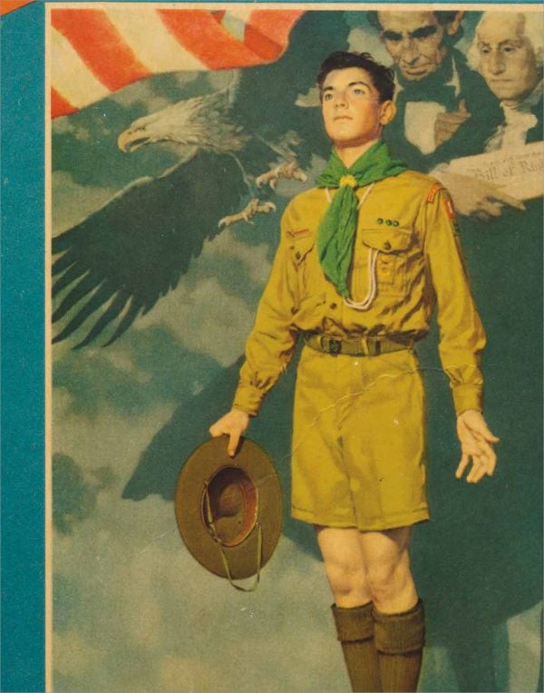 Close up of American bald eagle, orange beak, AMERICAN EAGLE in silver font below