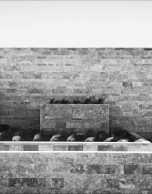 Low angled shot of interior building, Emre Arolat Scent of the Trace in white font above.