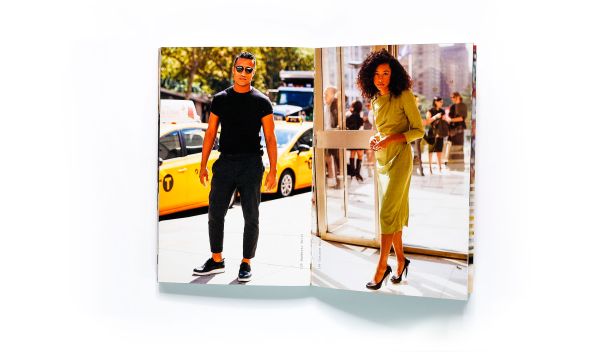 Black skinned woman in peplum top and glasses, high style dreadlocks, Street Culture in white font below