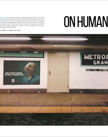 Circle painting with contents headers listed around like iris, on white cover, LA+ in black and blue font to top right corner