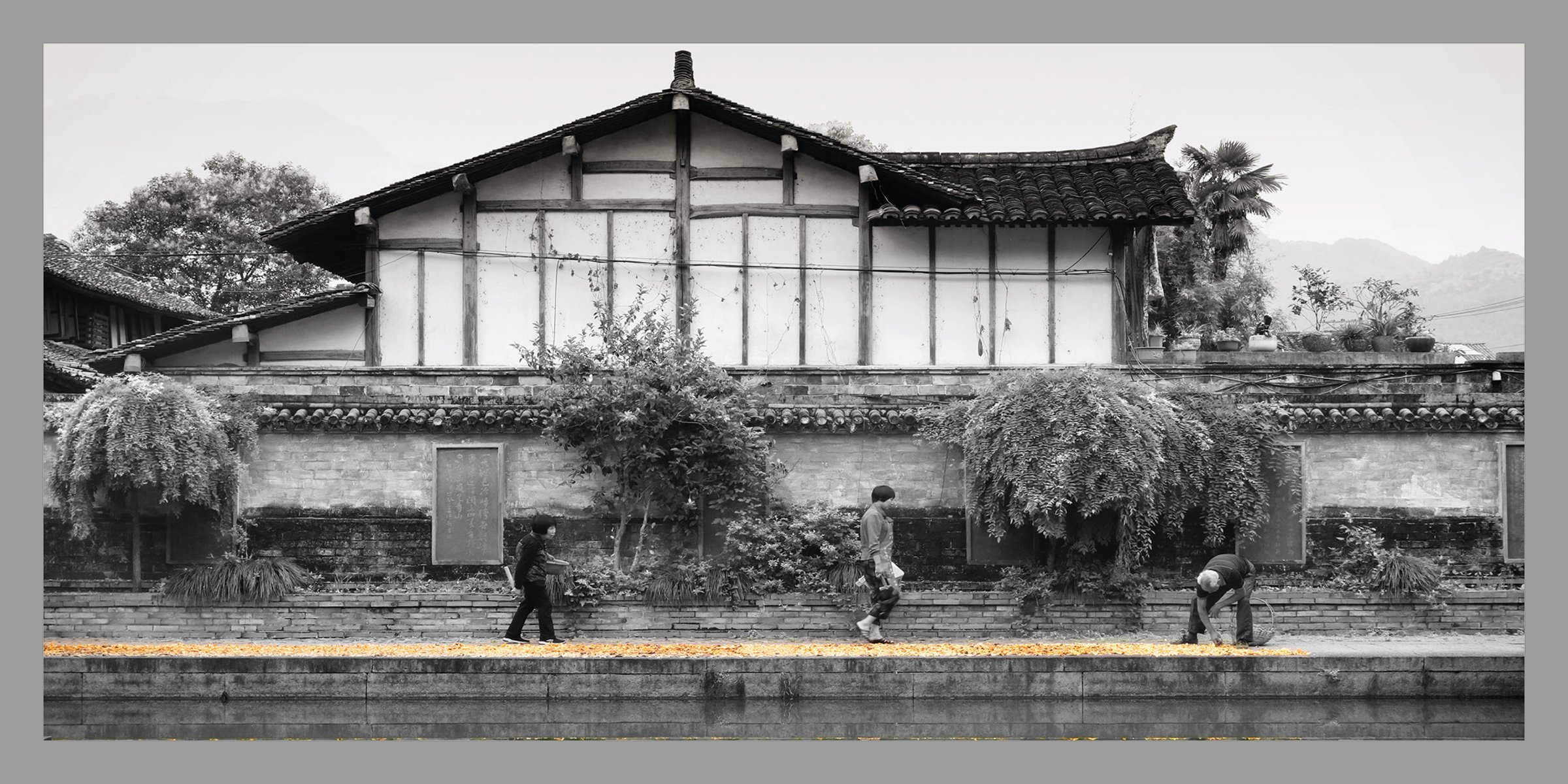 Black outline of cityscape, Chinese red stamp above, Beautiful China Reflections on Landscape Architecture in Contemporary China in black font to bottom right.