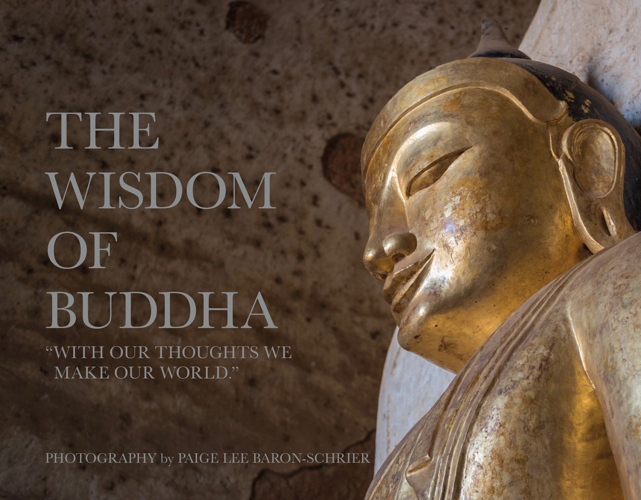 Low angled shot of face and shoulder of golden Buddha figure in temple, THE WISDOM OF BUDDHA in grey font to left.