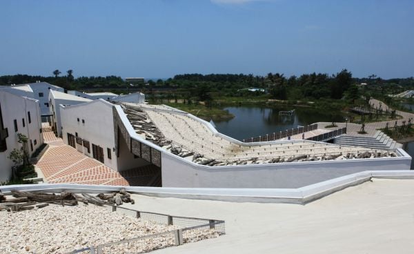 BI: the origin of architectural creativity in white font on black cover with multicoloured geometrical structured designs.