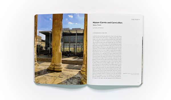 Urban city space featuring glass building with underpass and people walking about, Minding the City Fields notes on meaning in performative urban space in white font near centre.
