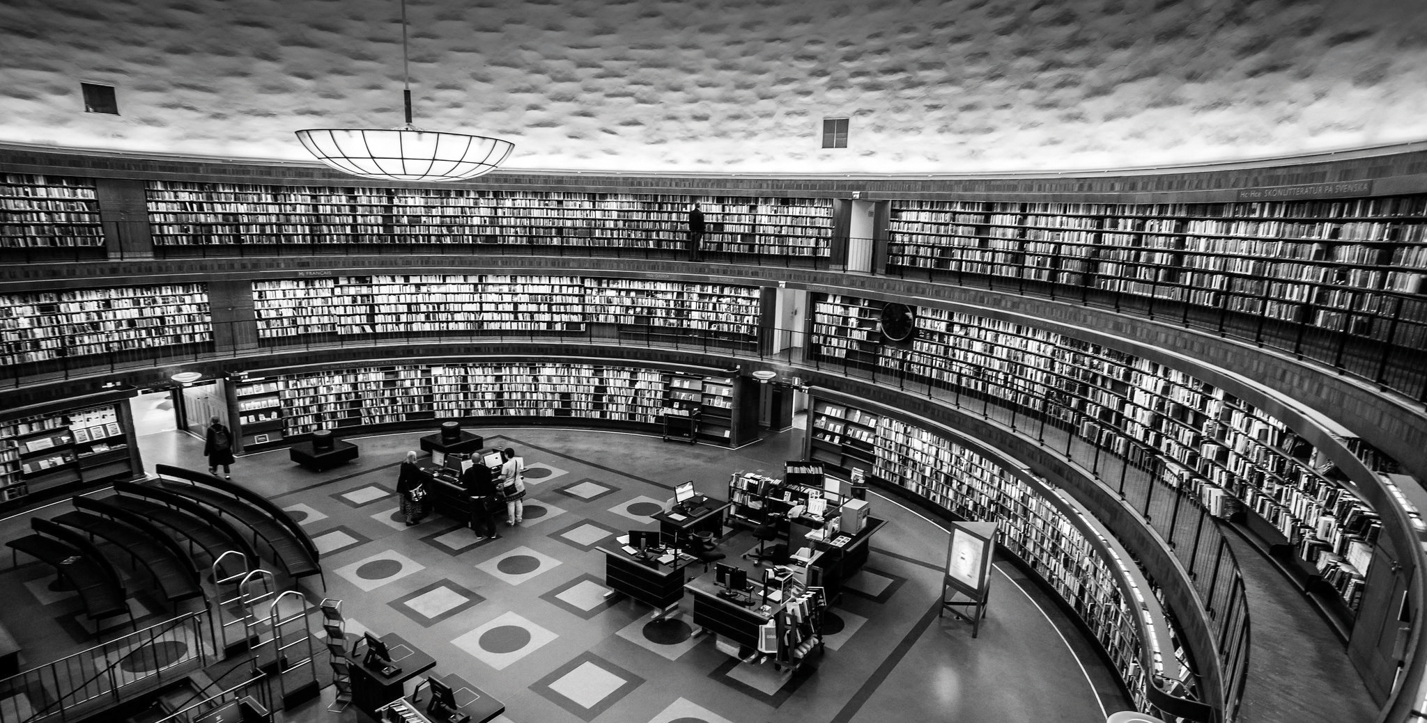 Architecture diagram of library in white, on red, orange and yellow cover, Reimagining the Library of the Future in white font above.