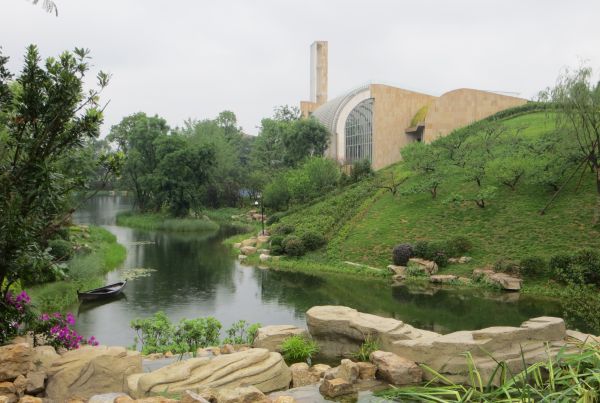 Dark brown cover with How Architecture Tells in bold mustard font