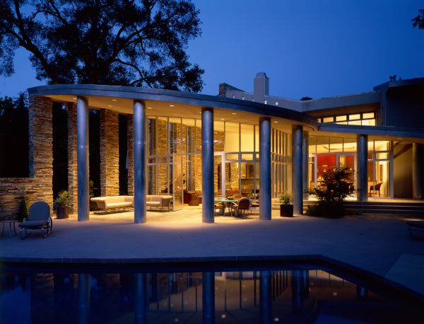 Dark brown cover with How Architecture Tells in bold mustard font