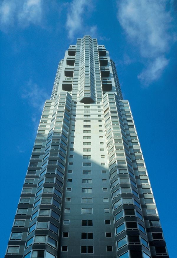 Book cover of Developing: My Life William Zeckendorf, featuring the American real estate developer on a building site, grinning, with foot on shovel. Published by ORO Editions.
