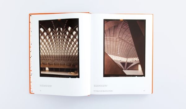 Book cover of G. E. Kidder Smith Builds: The Travel of Architectural Photography, with George Everard Kidder Smith sitting in front of Egyptian pyramid, with camera and tripod. Published by ORO Editions.