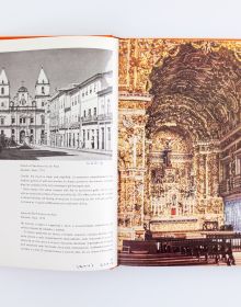 Book cover of G. E. Kidder Smith Builds: The Travel of Architectural Photography, with George Everard Kidder Smith sitting in front of Egyptian pyramid, with camera and tripod. Published by ORO Editions.