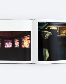 Book cover of Distillations, with a large installation slide projection of interior spaces. Published by ORO Editions.