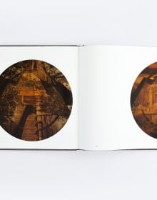 Book cover of Distillations, with a large installation slide projection of interior spaces. Published by ORO Editions.