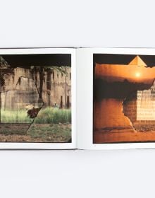 Book cover of Distillations, with a large installation slide projection of interior spaces. Published by ORO Editions.