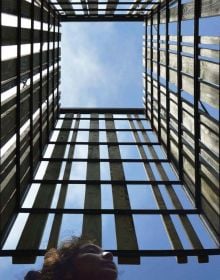 Book cover of Environmental Activism by Design, with a group of students standing in front of industrial landscape. Published by ORO Editions.