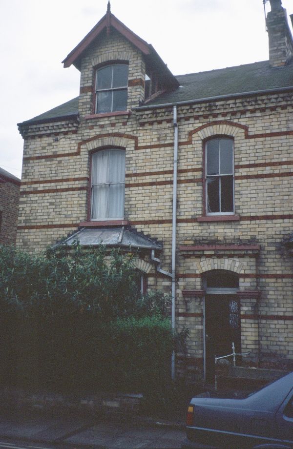 Book cover of An Architect's Address Book, featuring a wall of sixteen doorbells with name plates below. Published by ORO Editions.