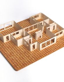 Book cover of Building Toys: An Architect’s Collection, with wooden building blocks scored with grid lines. Published by ORO Editions.