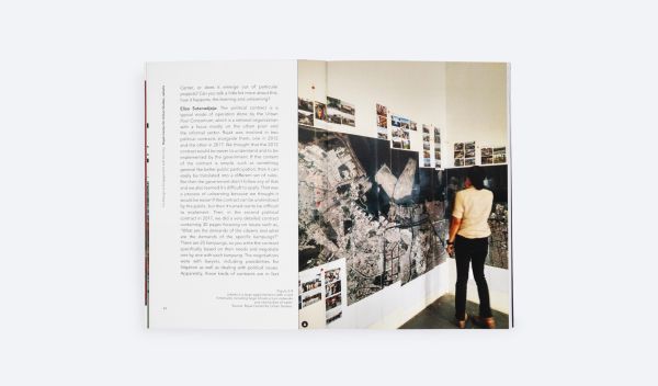 Cityscape full of protestors with banners, on cover of 'Co-Designing Publics', by ORO Editions.