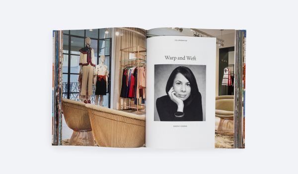 Brick wall painted with colourful triangular shapes, on cover of 'Droese Raney x Design', by ORO Editions.