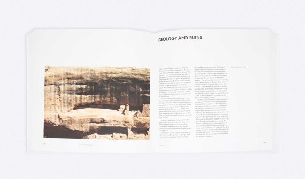 Book cover of Edward Ford's Searching for Authenticity: Rustic Architecture in America 1877-1940, with a building nestled into a rock face. Published by ORO Editions.