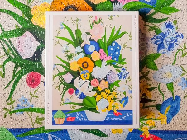 Puzzle box of Bouquet with Cupcake (dessert): 1000 piece puzzle. Published by Kinstler.