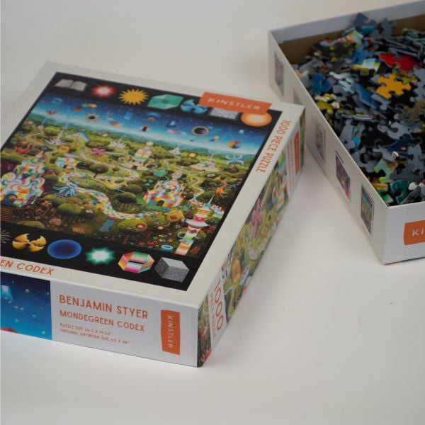 Puzzle box of Mondegreen Codex: 1000 piece puzzle; featuring a psychedelic artwork. By Kinstler.