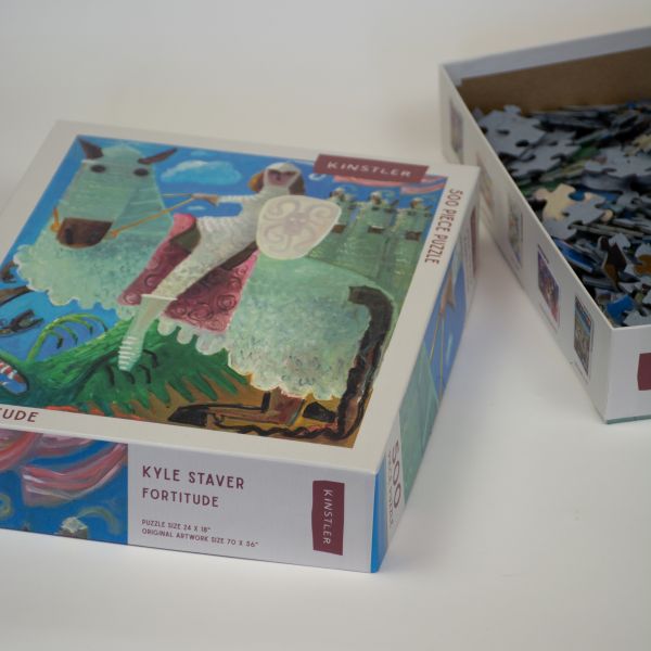 Puzzle box of Fortitude: 500 piece puzzle; featuring an artwork of a person riding a horse. Published by Kinstler.