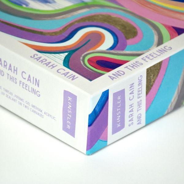 Box of and this feeling: 1000 piece puzzle; featuring a brightly-colored artwork. Published by Kinstler.