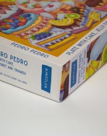 Puzzle box of Plate with Cake, Jelly Donut and Tiramisu: 1000 piece puzzle. Published by Kinstler.