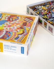Puzzle box of Plate with Cake, Jelly Donut and Tiramisu: 1000 piece puzzle. Published by Kinstler.