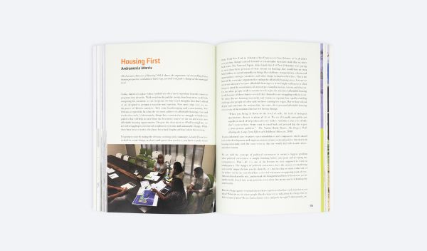 Book cover of Smallx20: Twenty Years of Community Engaged Design in New Orleans; featuring a group of people standing beneath a hexagonal patterned covering. Published by ORO Editions.