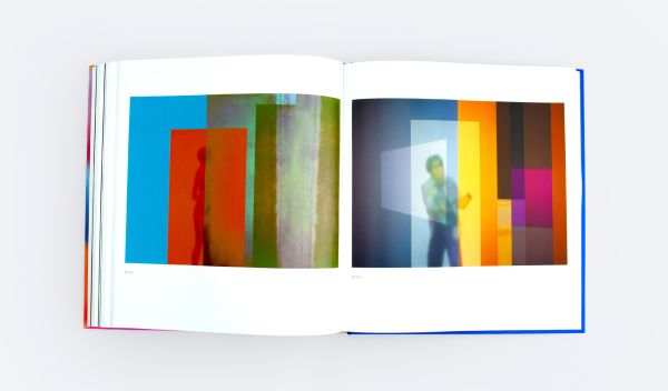 Book cover of All a Blur: Photographs from the Infinity Series; featuring a blurred silhouette of a person. Published by ORO Editions.