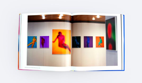 Book cover of All a Blur: Photographs from the Infinity Series; featuring a blurred silhouette of a person. Published by ORO Editions.