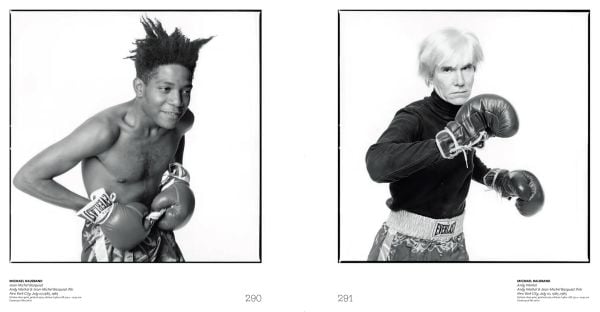 Book cover of Basquiat x Warhol, featuring Andy Warhol and Jean-Michel Basquait wearing boxing gloves. Published Editions Gallimard.