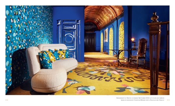 Book cover of La Manufacture Cogolin: A Century of Rug Making in the Gulf of Saint Tropez, with a wicker armchair with orange upholstery. Published by Albin Michel.