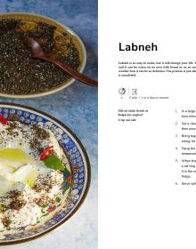 Chef Simona El-Harar holding a tub of food, food stall behind, on cover of 'Street food The Heart of Mediterranean Cooking', by Lannoo Publishers.