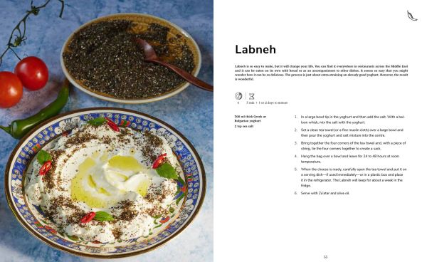 Book cover of Street food The Heart of Mediterranean Cooking, with Chef Simona El-Harar holding a tub of food, with a food stall behind. Published by Lannoo Publishers.