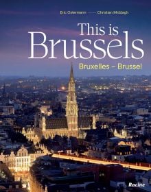 Book cover of This is Brussels; featuring the illuminated Belgian capital at night. Published by Lannoo Publishers.