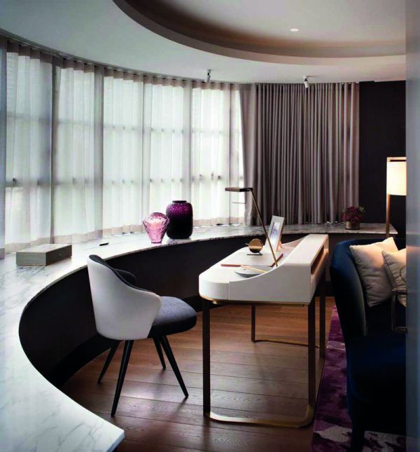 Surreal interior space with rotated staircase, gold and white objects floating in air, on black cover, of 'Thomas Griem, Homes', by Beta-Plus.