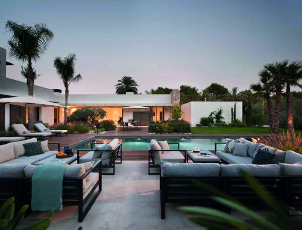 Surreal interior space with rotated staircase, gold and white objects floating in air, on black cover, of 'Thomas Griem, Homes', by Beta-Plus.