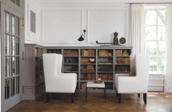 Book cover of Michael del Piero, with an doorway into a minimalist interior with white walls, pale wood floor, and a small tree in bronze pot. Published by Beta-Plus.