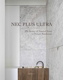 Interior bathroom with natural stone walls, sink below with wood surround, on cover of 'Nec Plus Ultra', by Beta-Plus.