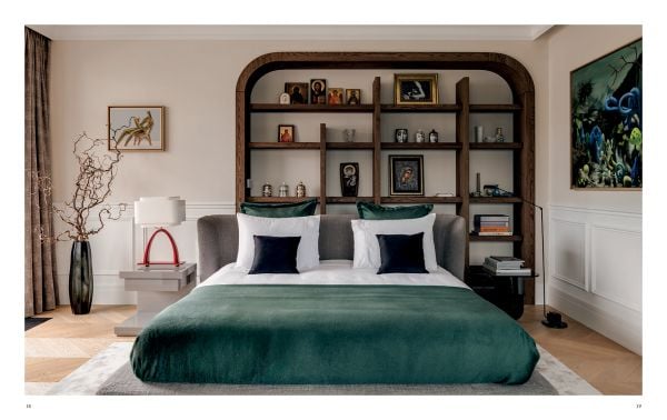 Book cover of Signature Interiors with a marble interior and dark wall panelling. Published by Beta-Plus.