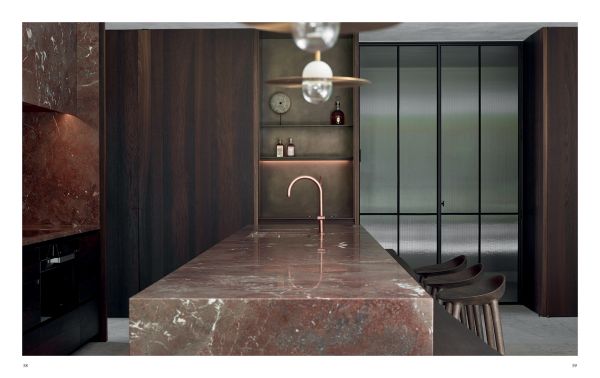 Book cover of Signature Interiors with a marble interior and dark wall panelling. Published by Beta-Plus.