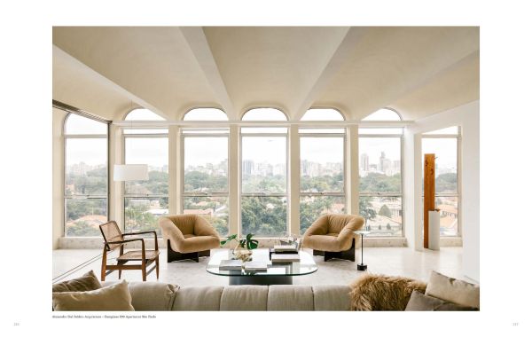 Book cover of In Focus: A Tribute to World's Best Architecture & Interior Photographers, with a pale interior wall arch. Published by Beta-Plus.