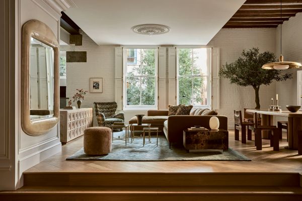 Book cover of Sense of Style: Artists & Creatives at Home, with an interior living room with white walls and wood flooring. Published by Beta-Plus.