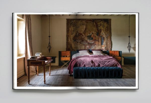 Book cover of Anne Derasse: Inner Time, with an interior room with curtain with tassel tie and stone column behind. Published by Beta-Plus.