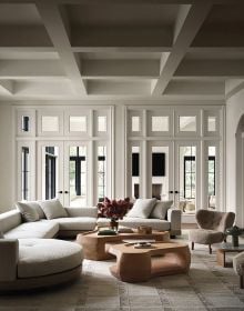 Book cover of Timeless Residences, with a pale interior hallway with stone tiled floor and two dark wood chairs with white upholstery. Published by Beta-Plus.